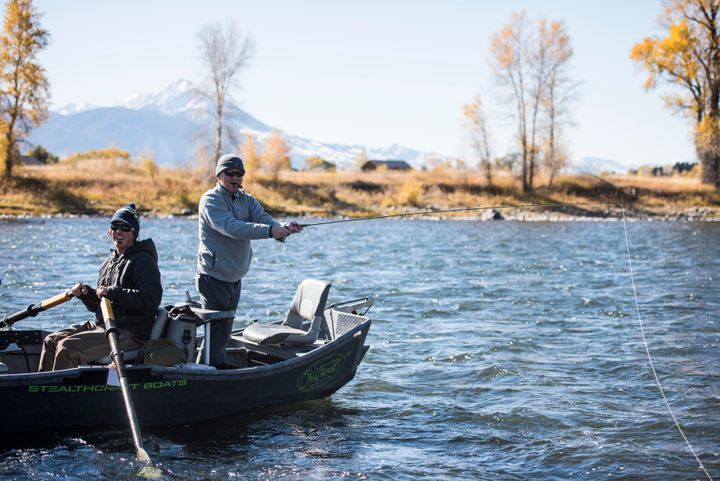 Brad Cowgill, who also worked on the Listen to America tour, and Chris Wayne go on a fly-fishing trip down the Yellowstone River near Livingston, Montana, on Oct. 15, 2017.