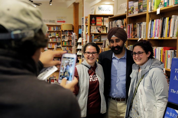 Hoboken's then-Mayor-elect Ravi Bhalla poses with supporters in a bookstore in New Jersey on Nov. 9, 2017. Bhalla is his state's first Sikh mayor.