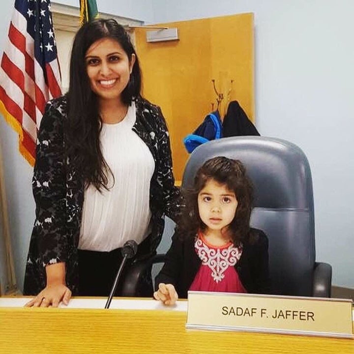 Sadaf Jaffer poses with her daughter at the Montgomery Township Municipal Building.