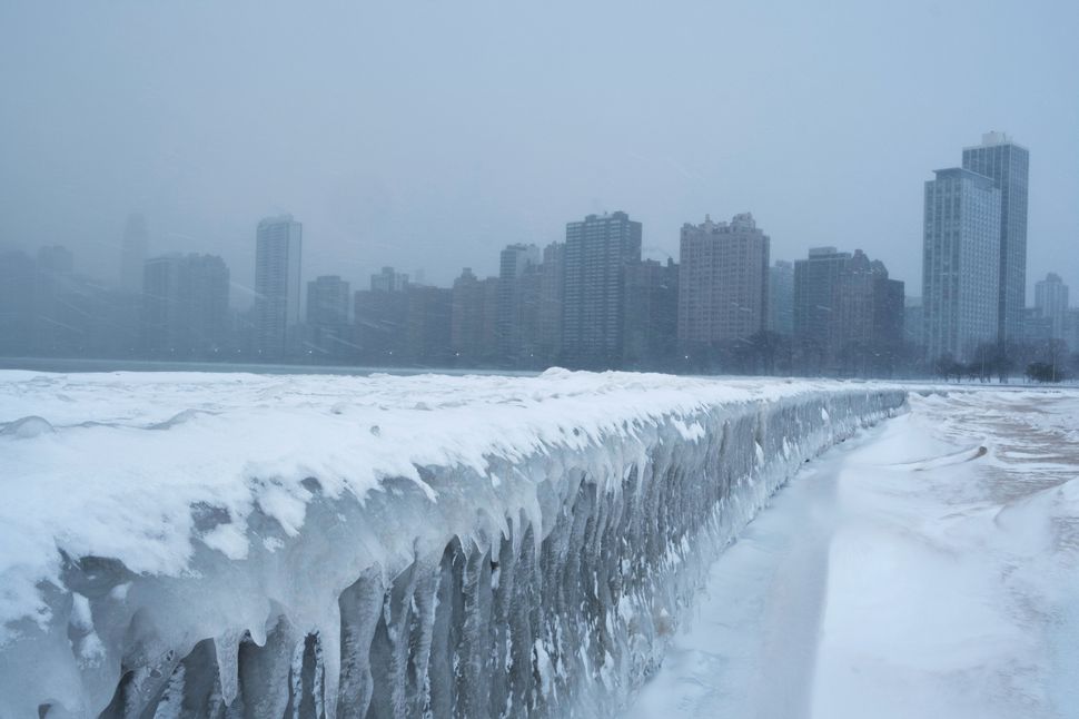 Icicles form on the walkway at North Avenue Beach of Lake Michigan in Chicago.
