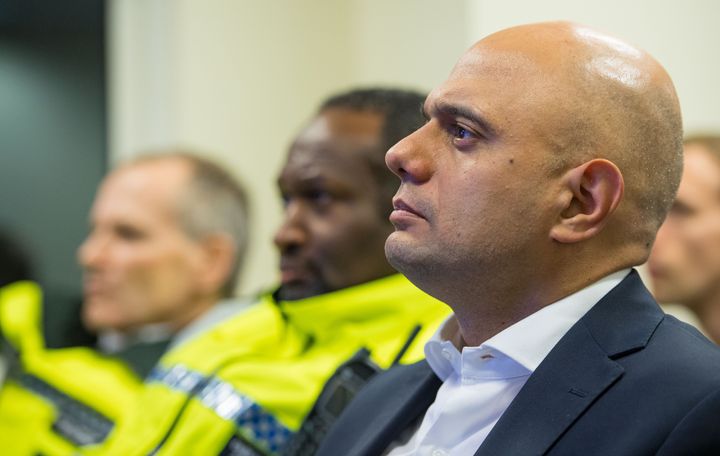 The home secretary sat in on a police briefing in south London on Wednesday night as he announced a crackdown on knife offenders.