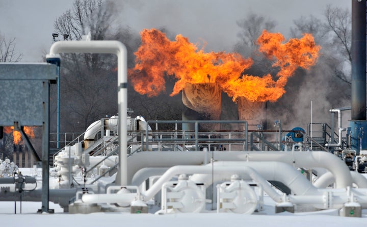 Fire comes out of the top of a compressor station at Consumers Energy in Armada Township, Mich. Consumers Energy has called o