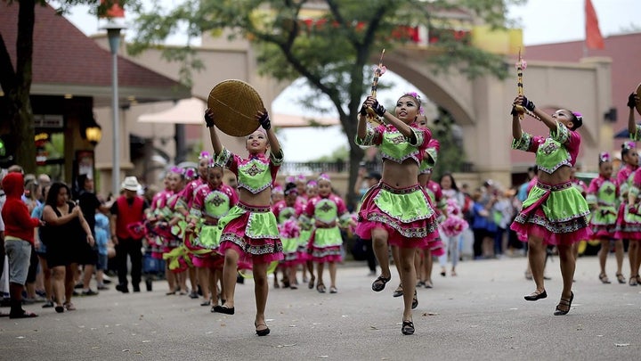 Dancers from a Hmong language and culture school perform at the 2018 Minnesota State Fair. Like other states, Minnesota is targeting immigrant children for census outreach since they’re likely to be the ones filling out forms in families without other English speakers.