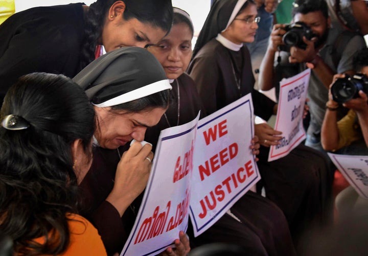 A nun cries as she participates in a sit in protest demanding the arrest of a Bishop Franco Mulakkal in Kochi, Kerala on 13 September 2018.