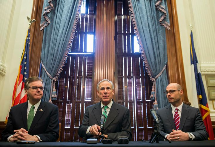 Texas Gov. Greg Abbott, middle, isn't worried about his state's disastrous citizenship probe. 