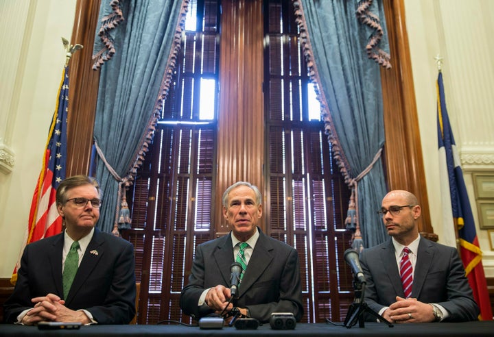 Texas Gov. Greg Abbott, middle, isn't worried about his state's disastrous citizenship probe. 