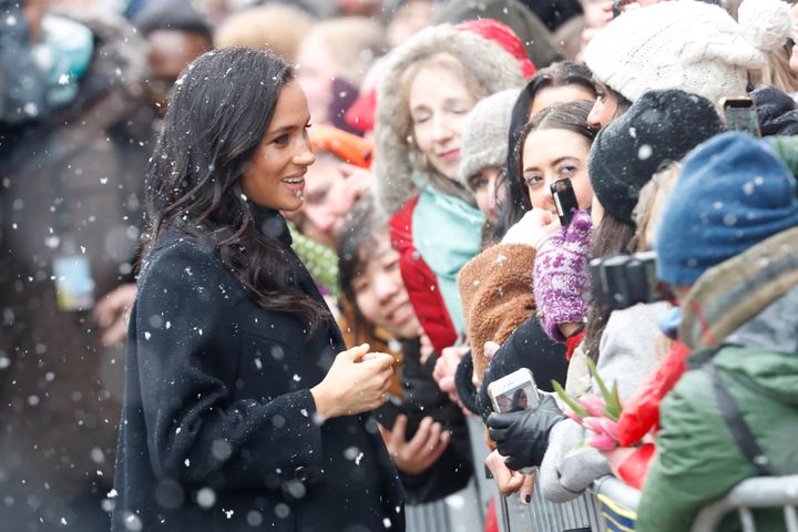 The Duchess of Sussex encountered a flurry of snow as she visited the Bristol Old Vic theatre in the city on Friday.