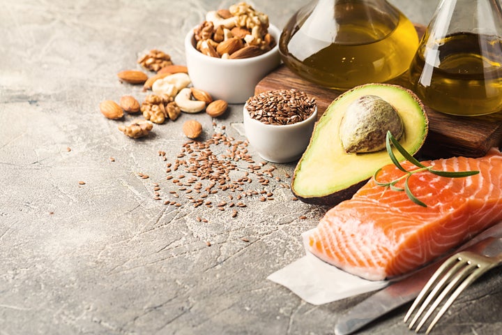 Foods like salmon, avocados, olive oil and nuts contain fats that are good for you.