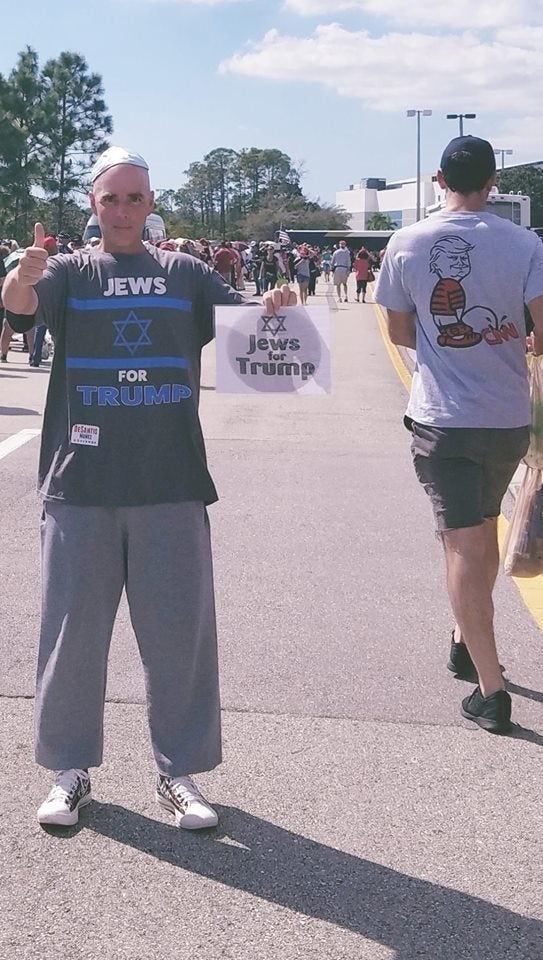 Jonathan Lee Riches poses as Jonah Rich at a Donald Trump rally in Fort Myers, Florida, on Oct. 31, 2018.