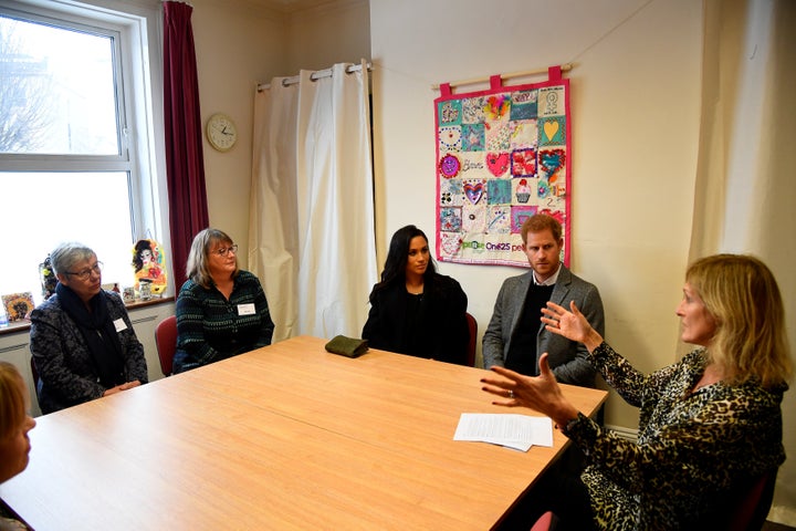 Meghan and Harry meet One25 staffers and volunteers.