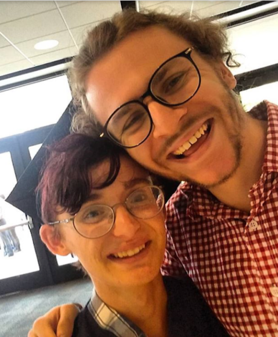 Winder at his graduation ceremony in 2018 with his partner.