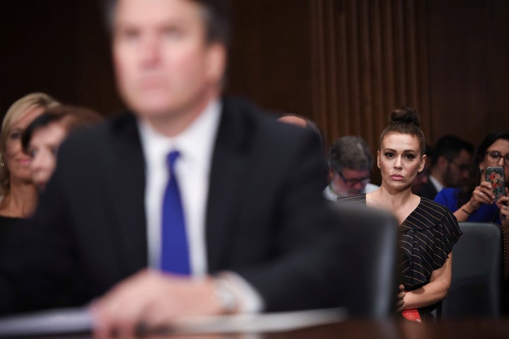 Actress Alyssa Milano listens as Supreme Court nominee Brett Kavanaugh testifies before the Senate Judiciary Committee on Sept. 27, 2018.