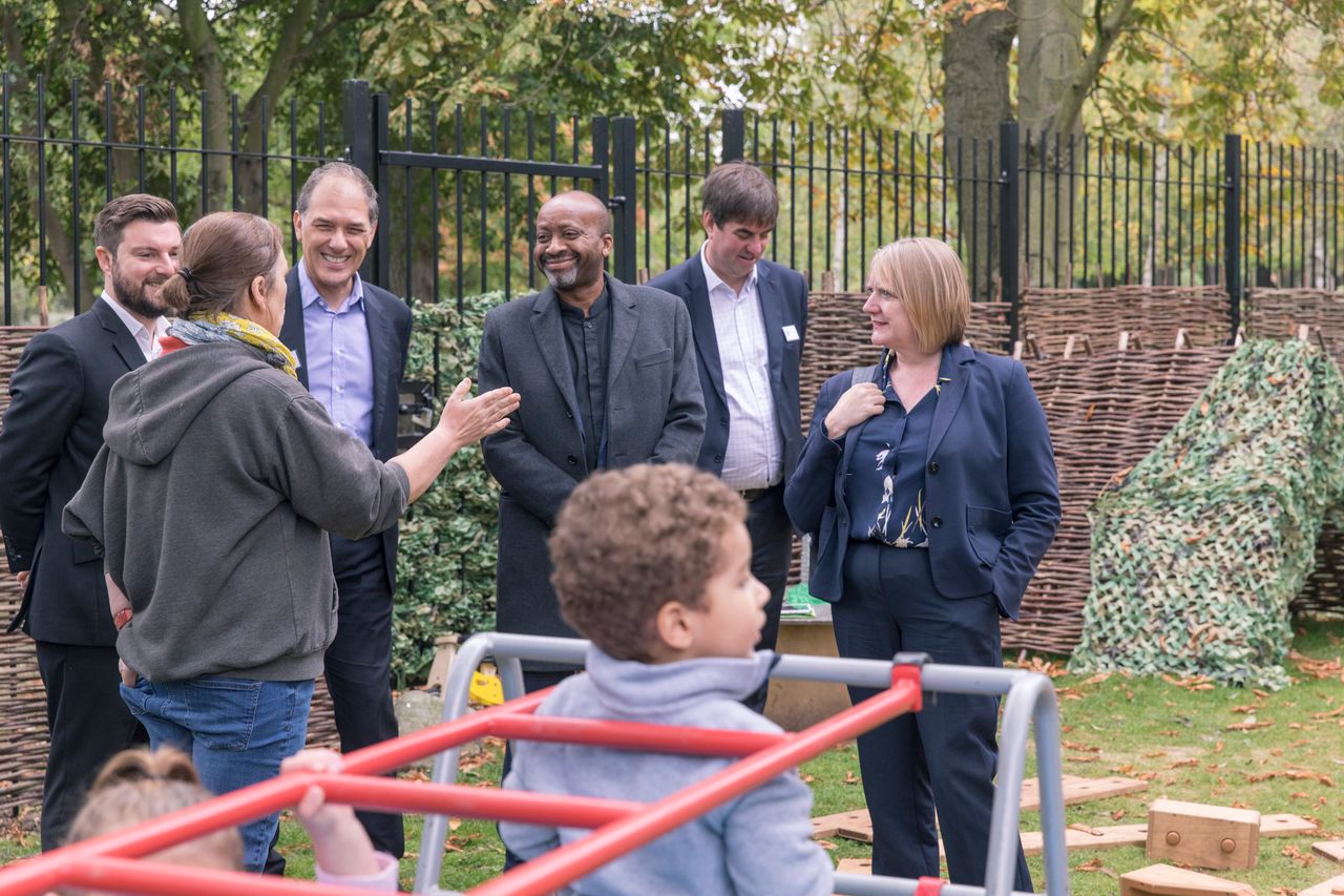 Joe Ejiofor (centre), leader of Haringey Council, at the opening of the Pocket Living Community Centre