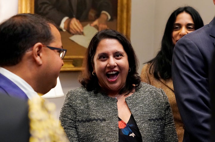 Neomi Rao reacts to President Donald Trump announcing that she is his choice for filling Brett Kavanaugh's former seat on the D.C. Circuit Court of Appeals.