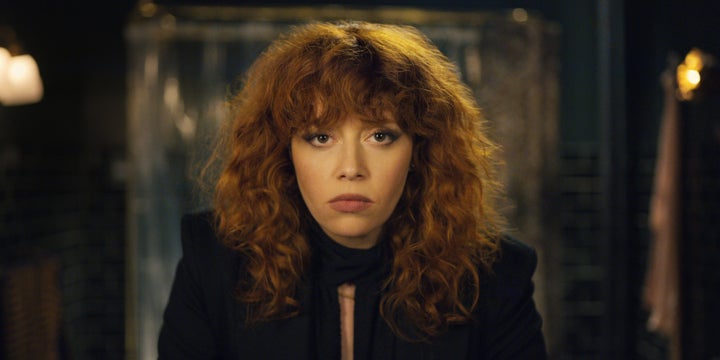 Nadia (Natasha Lyonne) gazing into her reflection, again, in "Russian Doll."