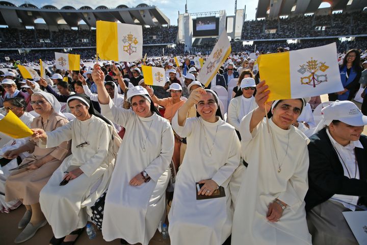 Nuns attend a mass, led by Pope Francis, at the Zayed Sports City Stadium in the United Arab Emirates on February 5, 2019. 