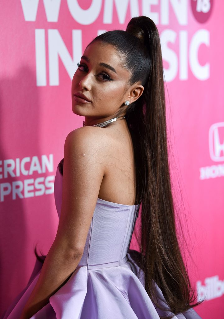 Ariana Grande is on the defensive after her “7 Rings” tattoo fail.