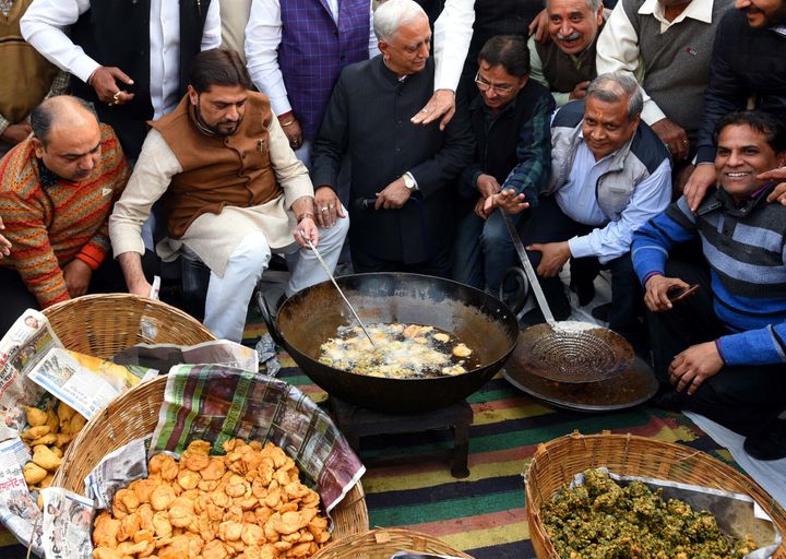 Prime Minister Narendra Modi has, in the past, equated selling pakoras with employment. In this photo, traders in Delhi sell pakoras as a mark of protest after the municipal corporation sealed their businesses in a 'sealing drive'. In his book, Goutam Das writes that India not only has an unemployment crisis but also an underemployment crisis.