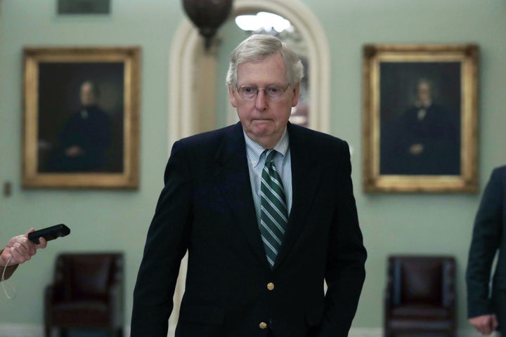 Sen. Mitch McConnell (R-Ky.) decried a provision that could help fill a shortage of volunteer poll workers as a "brand-n