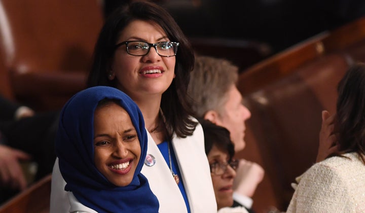 Reps. Rashida Tlaib (D-Mich.) and Ilhan Omar (D-Minn.) wear pins commemorating 7-year-old Guatemalan girl Jakelin Caal Maquin who died in Border Patrol custody in December.