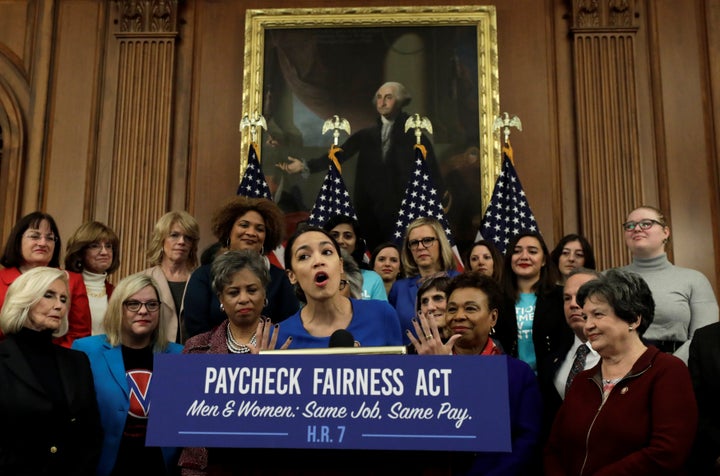 Rep. Alexandria Ocasio-Cortez discusses the Paycheck Fairness Act, at a press conference in Washington.