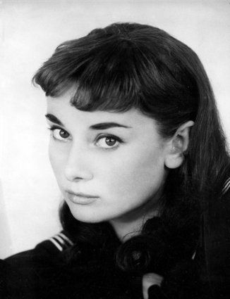 Actress Audrey Hepburn poses in character in her Broadway debut...