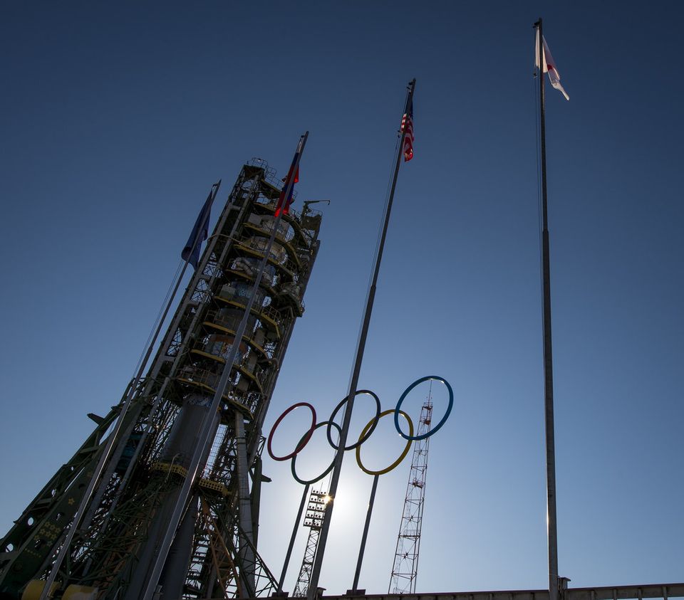 The Soyuz TMA-11M rocket, adorned with the logo of the Sochi Olympic Organizing Committee