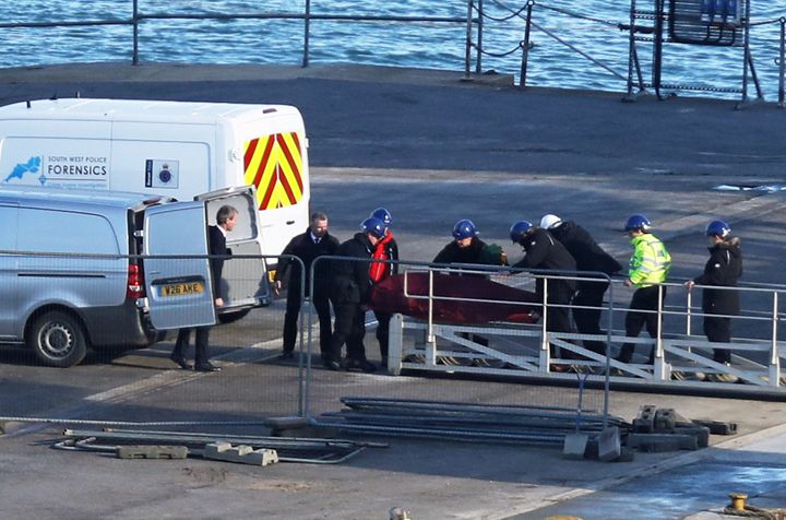 The as-yet unidentified body was brought ashore in Dorset on Thursday morning.