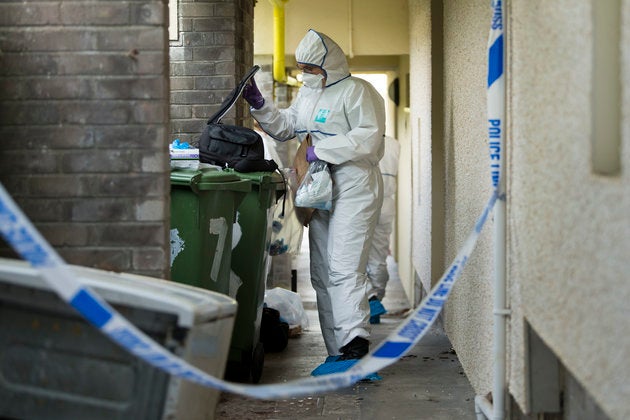 Forensic officers at the scene of Gaut's death