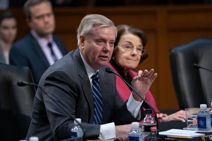 Sen. Lindsey Graham voted out dozens of President Trump's judicial nominees in his first act as the new chairman of the Senate Judiciary Committee.
