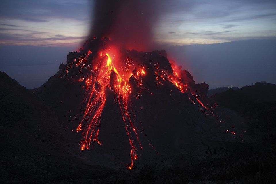 Glowing Rerombola lava dome of Paluweh volcano, Indonesia.