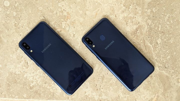 The Galaxy M10 (left) and M20 (right) both use Samsung's classic design, but the Galaxy M20 adds in a fingerprint scanner on the back.