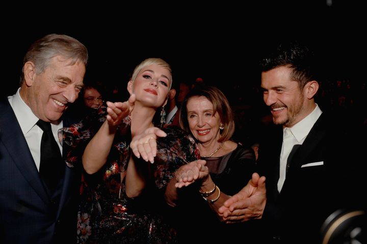 House Speaker Nancy Pelosi (D-Calif.) recreates her signature clap with Katy Perry and Orlando Bloom.