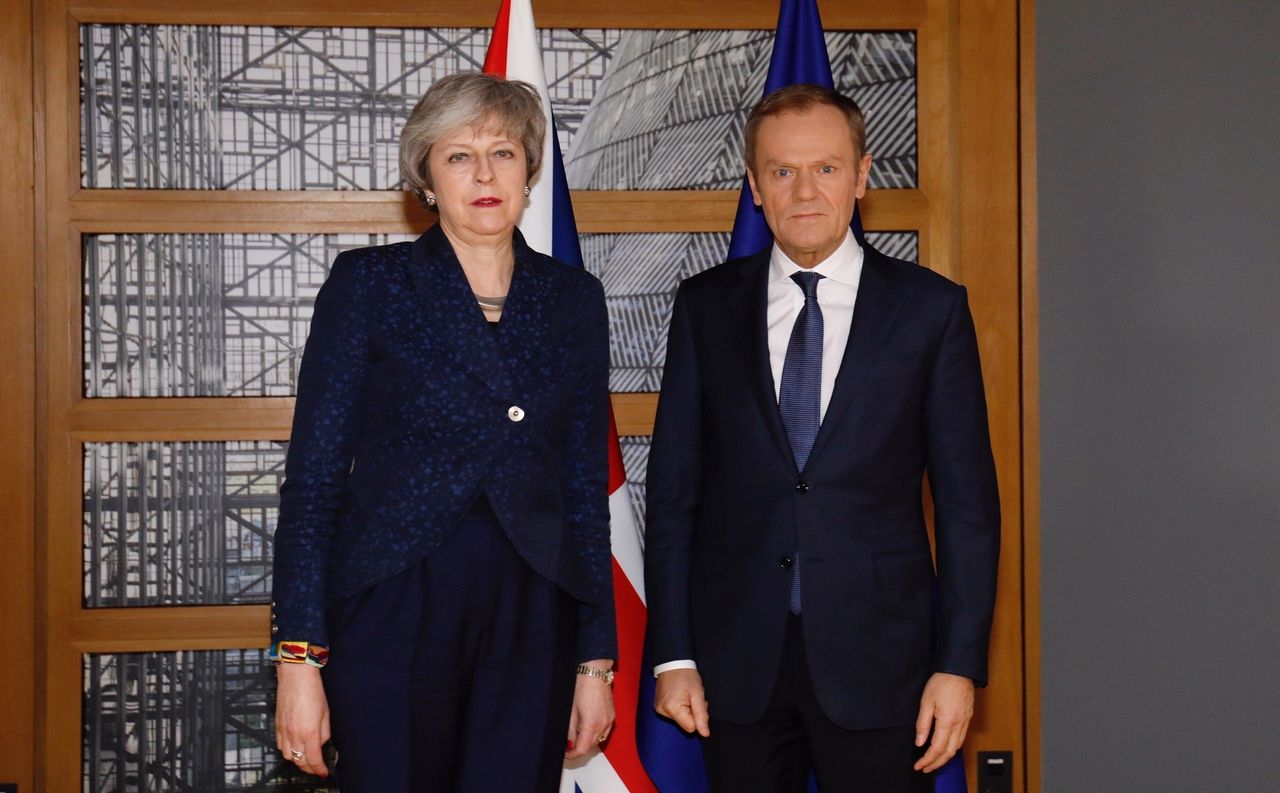 An unsmiling Theresa May with EU council president Donald Tusk