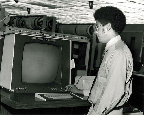 Washington at a computer terminal in his younger days.