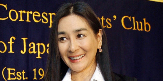 JAPAN - DECEMBER 18: Mariko Ishihara, actress and author, holds a her book titled 'Irregular Secrets' following a news conference at the Foreign Correspondents Club of Japan in Tokyo, Japan on Friday, December 8, 2006. (Photo by Haruyoshi Yamaguchi/Bloomberg via Getty Images)