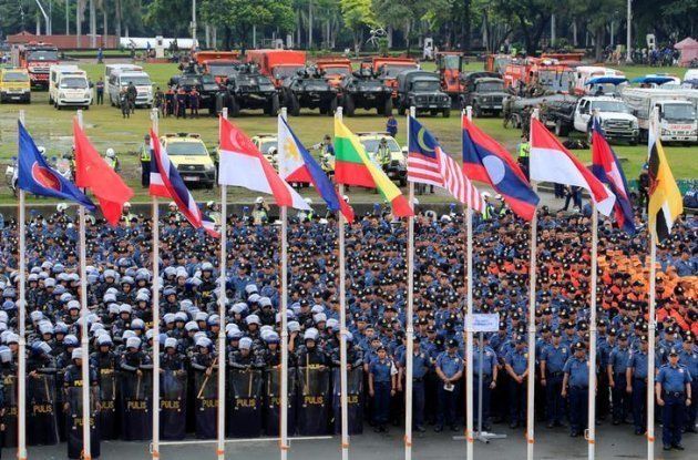Security officers gather before a ceremony for the Association of Southeast Asian Nations (ASEAN) summit in Manila, Philippines, November 5, 2017. © 2017 Reuters