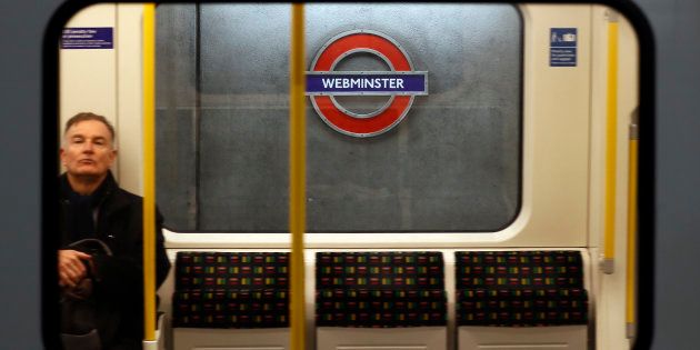 A tube train passes a sign reading 'Webminster' after Amazon rebranded Westminster tube station as a marketing stunt in central London, Britain January 12, 2017. REUTERS/Stefan Wermuth