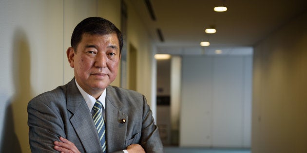 Shigeru Ishiba, Japan's minister in charge of regional revitalization, poses for a photograph in Tokyo, Japan, on Tuesday, June 14, 2016. Negative interest rates wont be allowed to affect ordinary depositors, Ishiba said in the run-up to a July election in which the opposition has sought to make the nations monetary policy an issue. Photographer: Akio Kon/Bloomberg via Getty Images