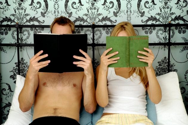 Couple reading in bed