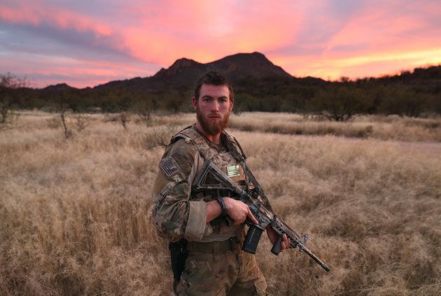 PIMA COUNTY, AZ - NOVEMBER 16: Civilian paramilitary volunteer James, 24, for Arizona Border Recon (AZBR), stands near the U.S.-Mexico border on November 16, 2016 in Pima County, Arizona. The college student said he felt it is his duty to help protect the nation's borders. "There's evil going on here,"he said. AZBR is made up mostly of former U.S. military servicemen, stages reconnaissance and surveillance operations against drug and human smugglers in remote border areas. The group claims up to 200 volunteers and does not consider itself a militia, but rather a group of citizens supplimenting U.S. Border Patrol efforts to control illegal border activity. With the election of Donald Trump as President, border security issues are a top national issue for the incoming Administration. (Photo by John Moore/Getty Images)