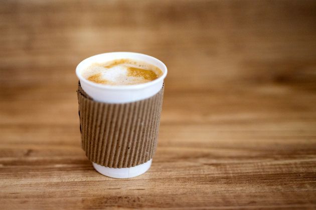 Paper cup of hot coffee
