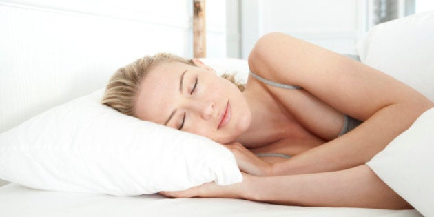 Woman sleeping on bed