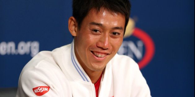 NEW YORK, NY - SEPTEMBER 06: Kei Nishikori of Japan speaks to the media after defeating Novak Djokovic of Serbia in their men's singles semifinal match on Day Thirteen of the 2014 US Open at the USTA Billie Jean King National Tennis Center on September 6, 2014 in the Flushing neighborhood of the Queens borough of New York City. Nishikori defeated Djokovic in four sets 6-4, 1-6, 7-6, 6-3. (Photo by Matthew Stockman/Getty Images)