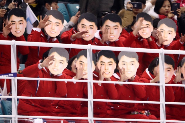 GANGNEUNG, SOUTH KOREA - FEBRUARY 10: North Korean cheerleaders sing and wave during the Women's Ice Hockey Preliminary Round - Group B game between Switzerland and Korea on day one of the PyeongChang 2018 Winter Olympic Games at Kwandong Hockey Centre on February 10, 2018 in Gangneung, South Korea. (Photo by Ronald Martinez/Getty Images)