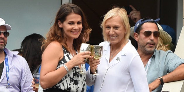 NEW YORK, NY - SEPTEMBER 06: Martina Navratilova (R) and Julia Lemigova celebrate their engagement during day 13 of the 2014 US Open at USTA Billie Jean King National Tennis Center on September 6, 2014 in New York City. (Photo by Uri Schanker/GC Images)