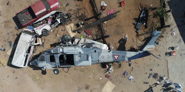ヘリ墜落現場の上空写真(Photo credit should read MARIO VAZQUEZ/AFP/Getty Images)