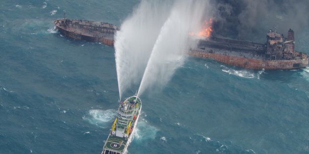 A rescue ship works to extinguish the fire on the stricken Iranian oil tanker Sanchi in the East China Sea, on January 10, 2018 in this photo provided by Japan?s 10th Regional Coast Guard. Picture taken on January 10, 2018. 10th Regional Coast Guard Headquarters/Handout via REUTERS ATTENTION EDITORS - THIS PICTURE WAS PROVIDED BY A THIRD PARTY.