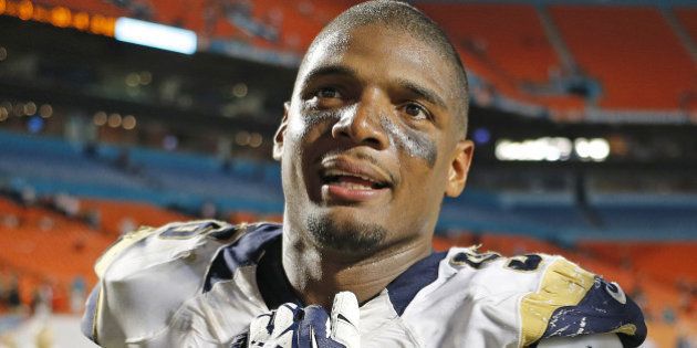 MIAMI GARDENS, FL - AUGUST 28: Michael Sam #96 of the St. Louis Rams exits the field after the preseason game against the Miami Dolphins on August 28, 2014 at Sun Life Stadium in Miami Gardens, Florida. The Dolphins defeated the Rams 14-13. (Photo by Joel Auerbach/Getty Images)