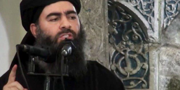FILE - This file image made from video posted on a militant website Saturday, July 5, 2014, which has been authenticated based on its contents and other AP reporting, purports to show the leader of the Islamic State group, Abu Bakr al-Baghdadi, delivering a sermon at a mosque in Iraq during his first public appearance. The Islamic State group's gains over the past year have been sizeable. For nearly two decades, al-Qaida was unchallenged as the world's most prominent terrorist organization. But IS has stormed forward to rival it _ and even surpass it in places. (Militant video via AP, File)